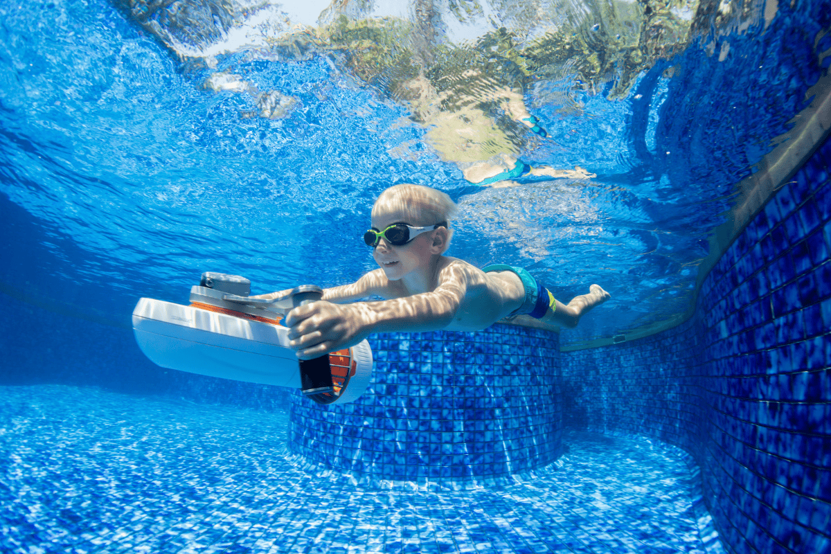 child swimming in pool at our pattaya family hotel